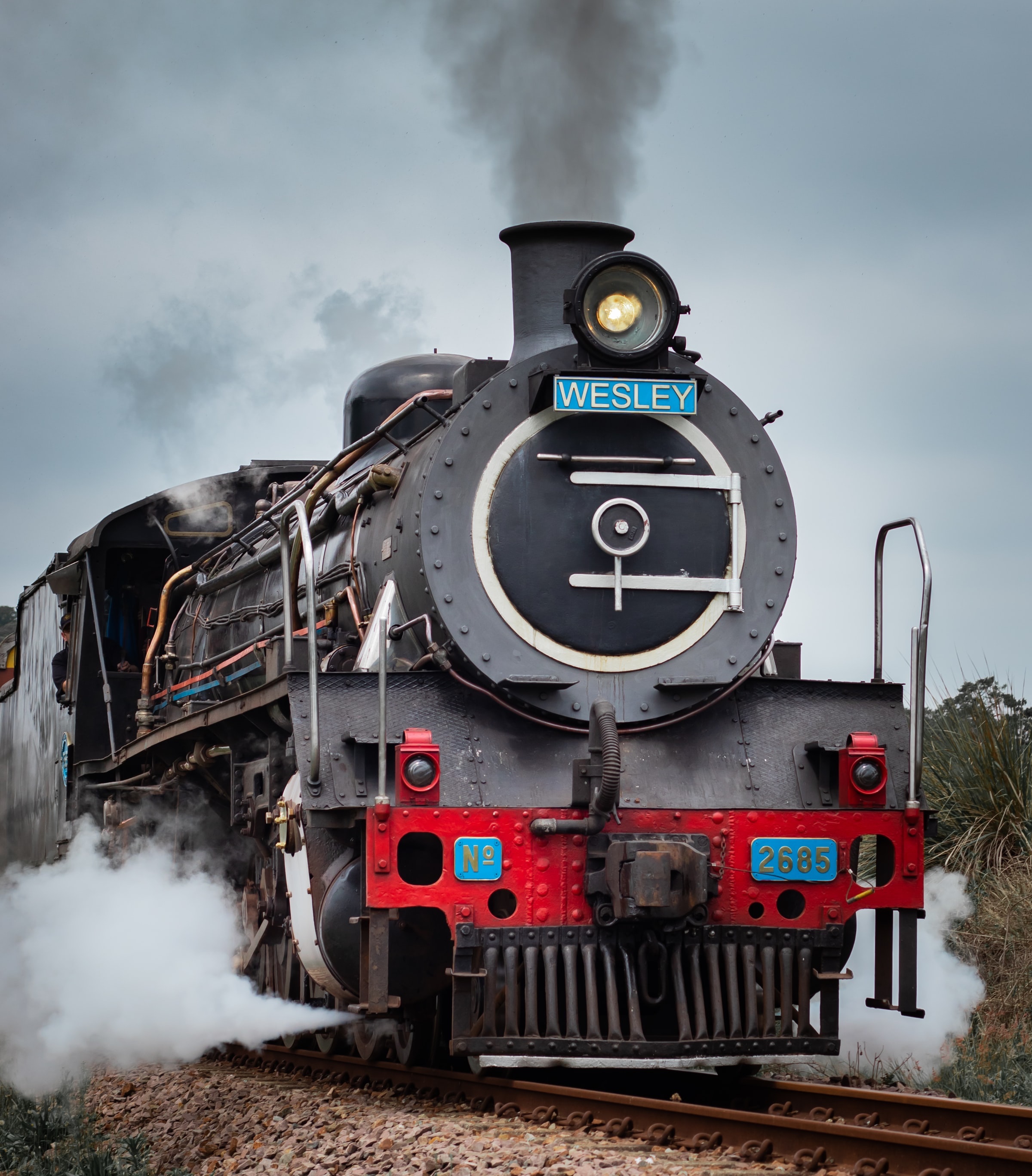 An Oncoming Event: A Dream Of A Black Older-Style Train & A City Center